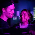 Closeup of a man and woman at a concert